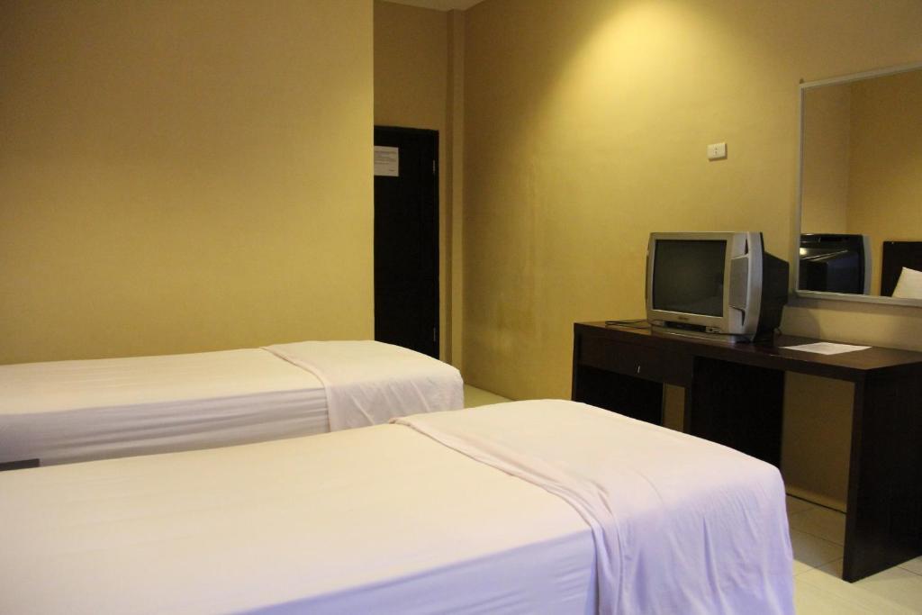 Hotel Sing A Song Pematangsiantar Szoba fotó