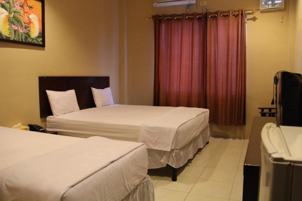 Hotel Sing A Song Pematangsiantar Szoba fotó