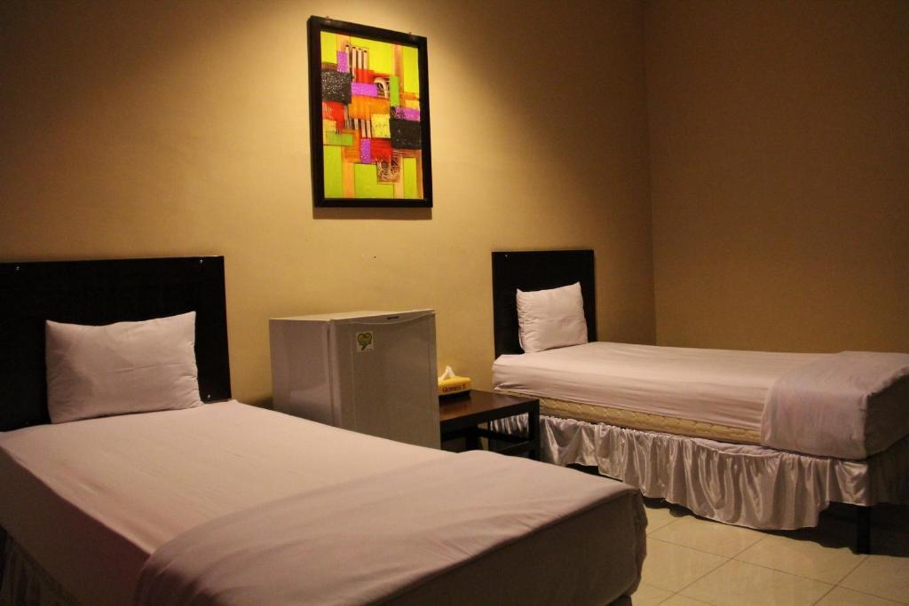 Hotel Sing A Song Pematangsiantar Szoba fotó