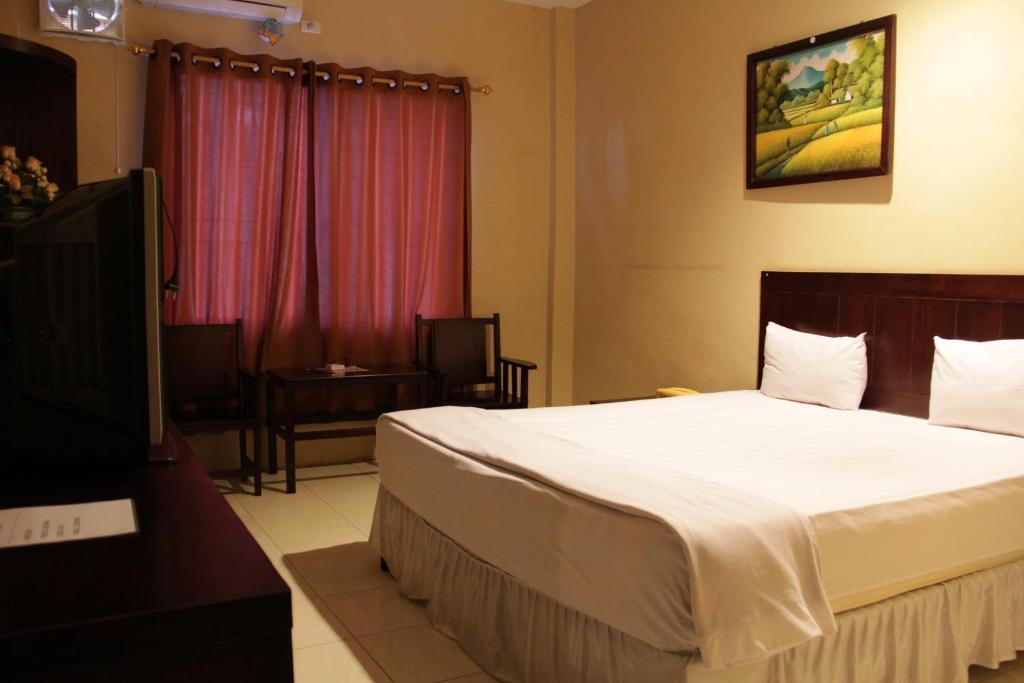 Hotel Sing A Song Pematangsiantar Szoba fotó